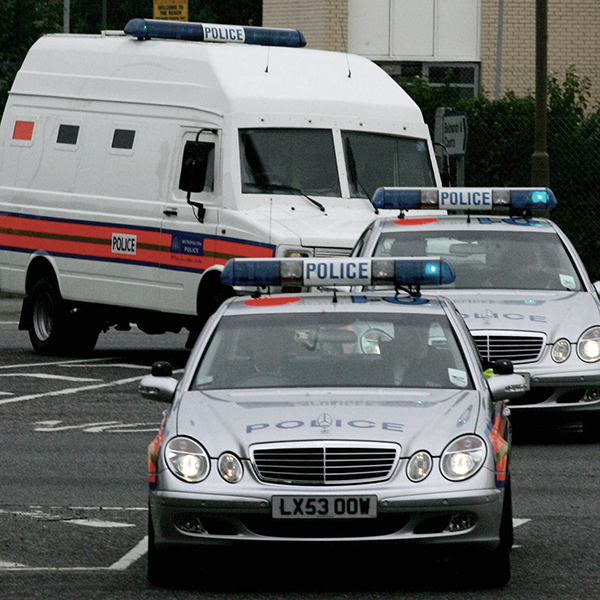 A police van transporting London bombing suspect Osman Hussain, arrives at Woolwich Crown Court, London, 23 September 2005, after he was extradited from Italy on murder conspiracy charges. Hussain is alleged to have attempted to detonate an explosive device on board an underground train carriage at Shepherd's Bush tube station on 21 July 2005. AFP PHOTO/CARL DE SOUZA