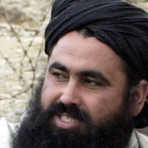 An undated photo from 2004 shows Pakistani Taliban chief Baitullah Mehsud speaking as he arrives for a meeting in South Waziristan. Pakistan said on August 7 it believed that wanted Taliban warlord Baitullah Mehsud was killed in a US drone attack, which if confirmed would score a coup in the US-led fight against Islamist militants. The death of the notorious commander could deal a heavy blow to the sizeable Taliban movement commanded by Mehsud, who has a five-million-dollar US bounty on his head after Washington branded him 'a key Al-Qaeda facilitator'. Tribesmen said on condition of anonymity that Mehsud was killed with his wife when a US drone fired two missiles into a family home in the Laddah area of South Waziristan on August 5. AFP PHOTO/A MAJEED